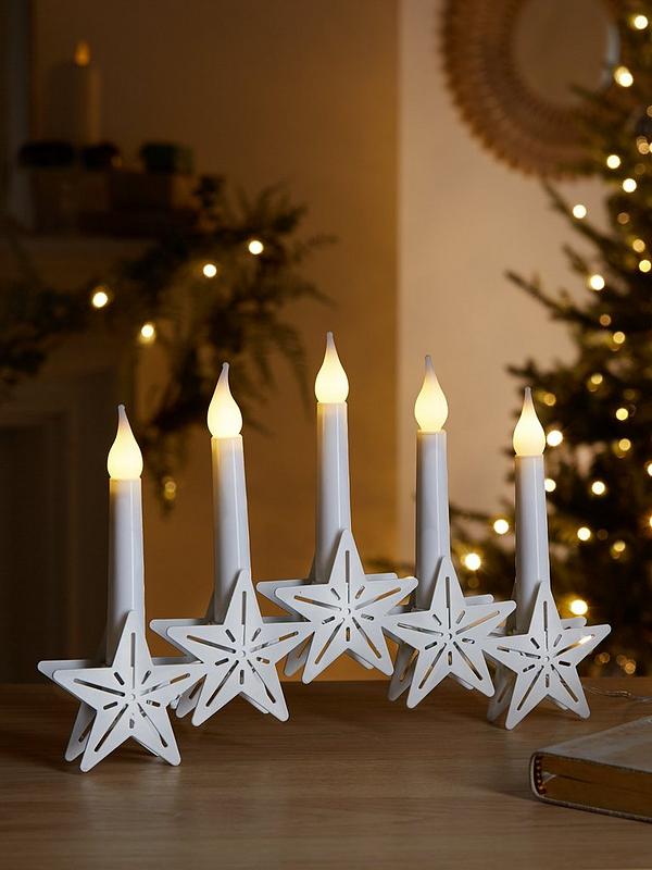 Flat Non Polished Metal Star Candle Holder, For Home, Hotel, Feature : Attractive Designs
