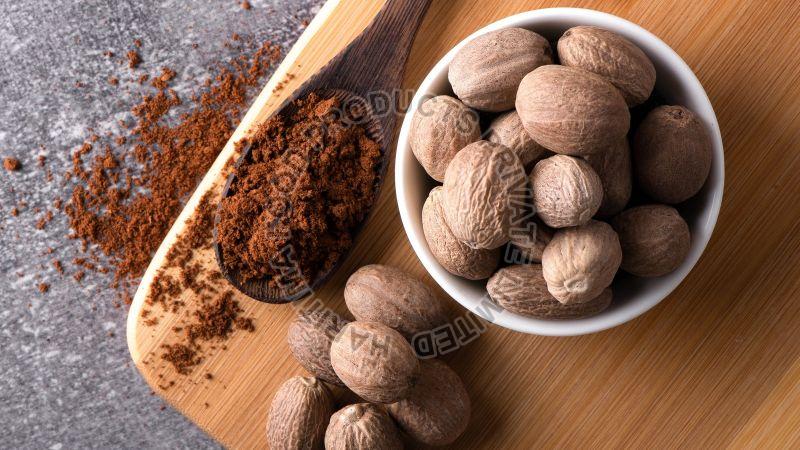 Brown Round Nutmeg Seed, for Cooking Spices, Purity : 100%