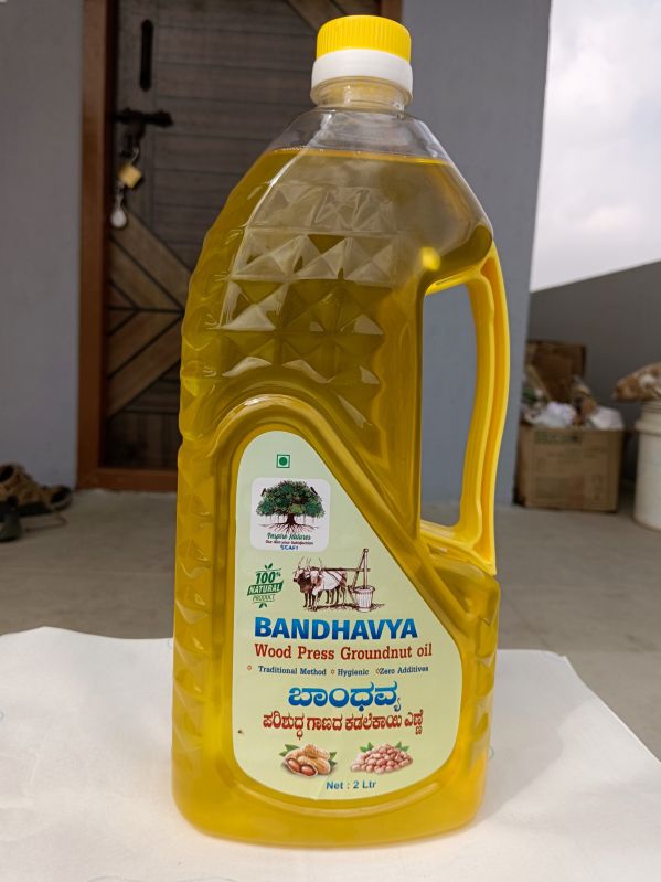 Wood pressed groundnut oil 2 L, Packaging Type : Food Grade PET Bottle