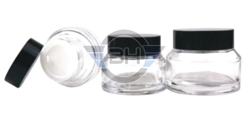 Polished Plain Clear Slant Glass Jar, for Cosmetic Storage, Feature : Crack Proof, Fine Finishing, Scratch Resistant