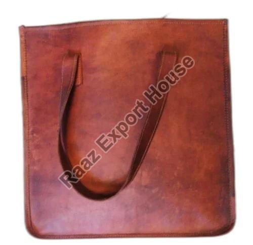 Plain Polished Ladies Brown Leather Handbag, Size : 15x10 cm