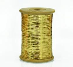 Golden Metallic Badla Zari Thread, for Textile Industry, Packaging Type : Roll