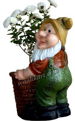 An old man holding plant pot