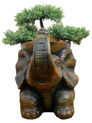 Brown elephant shaped plant pot