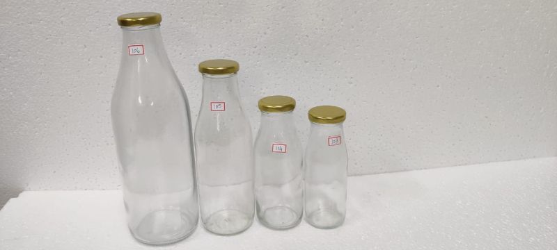 Transparent 500 ml Glass Milk Bottle, Shape : Round