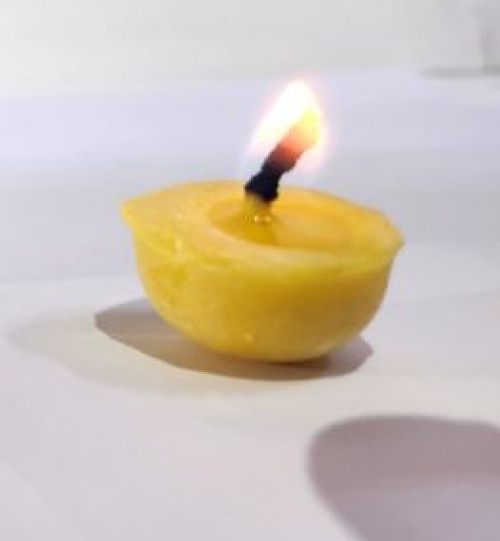 Yellow Pure Ghee Diya, for Temple, Worship, Packaging Type : Plastic Container