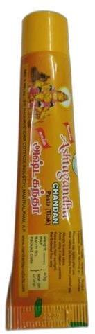 Golden Sandalwood Paste, for Religious, Packaging Type : Plastic Tube