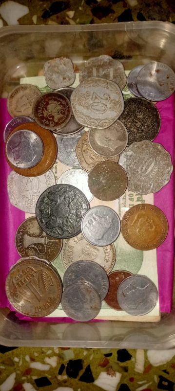 Box of old coins Collection and old 5 Rupees Note