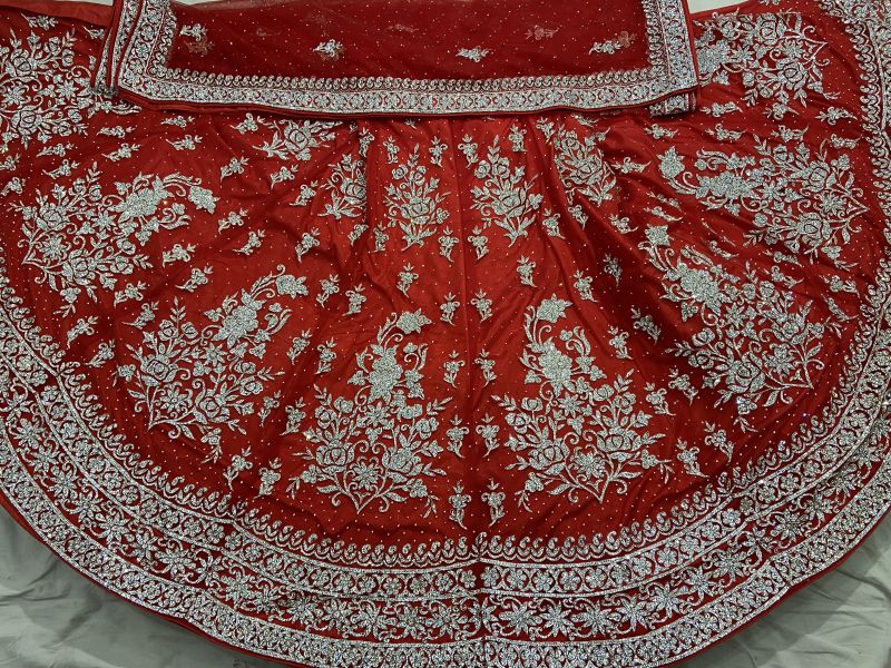 Ladies Handmade Zari Embroidery Lehenga Choli, Feature : Eco Friendly, Easy Washable, Dry Cleaning