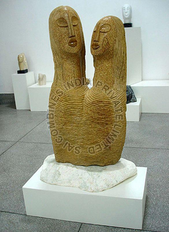 YELLOW MARBLE STONE COUPLE SCULPTURE