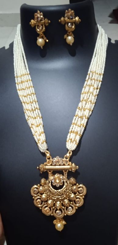 ten layered white beads golden earrings pendant necklace set