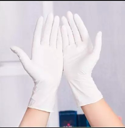 Nitrile Examination Gloves Pack of 100, for Beauty Salon, Food Service, Light Industry, Feature : Flexible