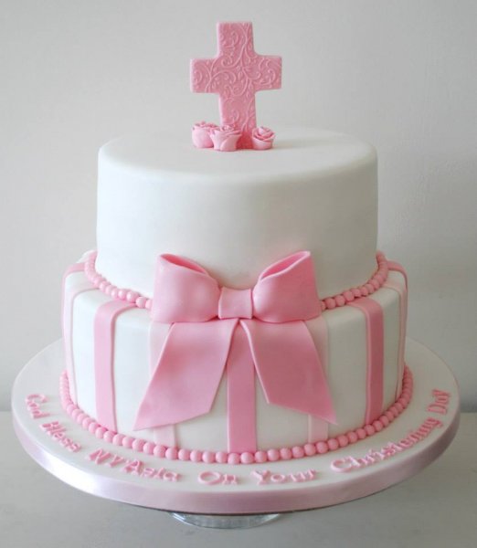 2 tiered christening cake with cross