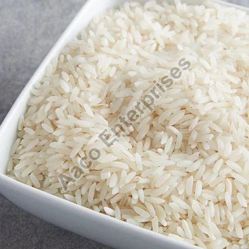 Natural White Solid Organic Jasmine Rice, for Cooking, Food, Human Consumption, Packaging Type : Plastic Bags