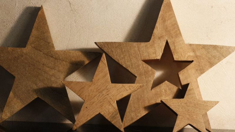 Set of 4 Wooden Hanging Stars, for Decoration, Feature : Attractive Look