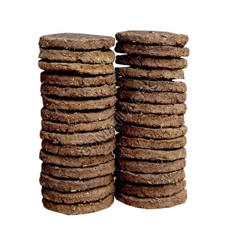 Natural Brown Round Dried Cow Dung Cakes, for Personal, Industrial, Pack Size : 25Kg