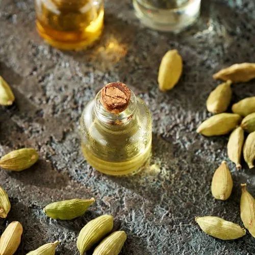 Liquid Cardamom Oil, for Cooking, Packaging Type : Plastic Bottels