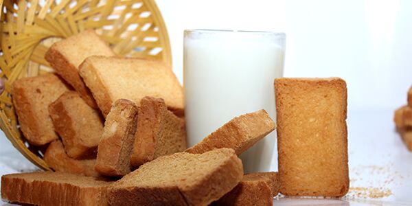 Crunchy Milk Rusk, for Breakfast Use, Packaging Size : 54g Pouch, 300g Pouch, 600g Mono Box