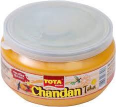 Round Sandalwood Paste Tota Chandan Tika 100g, For Puja, Pattern : Plain