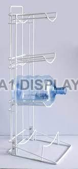 Stainless Steel Polished Water Bottle Display Stand, for Mall, Medical Store, Feature : Dust Proof