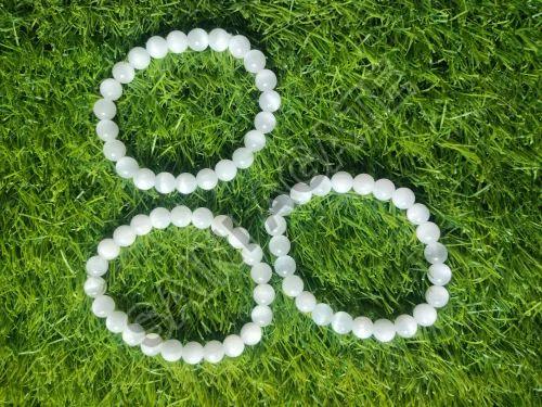 Saini Agate Round Polished Selenite Gemstone Bracelet, for Wearing Healing Reki Maditaion, Size : 8 mm