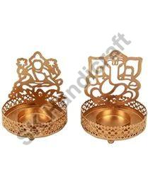 Copper Brown Polished Metal Laxmi Ganesh T-Light Holder, for Home Decoration, Feature : Attractive Designs