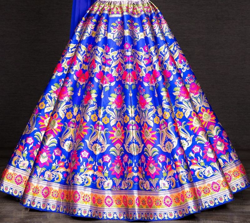 Stitched Printed Banarasi Fabric Full Flared Lehenga, Occasion : Wedding Wear, Party Wear, Bridal Wear