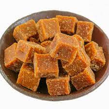 Brownish Solid Natural Sugarcane Jaggery Cube, for Sweets, Packaging Type : Loose