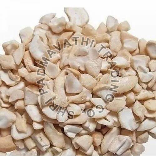Creamy 8 Pieces Cashew Nuts, for Sweets, Direct Consumption, Packaging Type : Plastic Pack