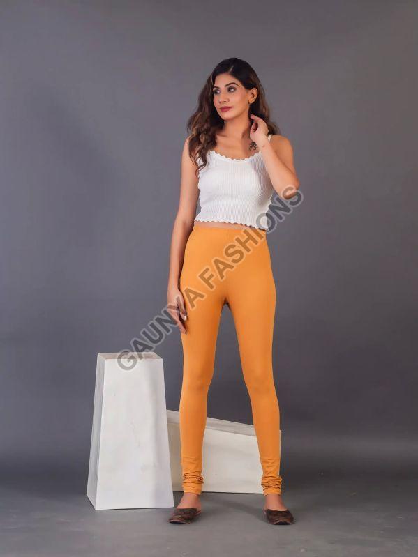 Gaunya Fashions Plain Chuidar Orange Churidar Leggings, Occasion : Casual Wear