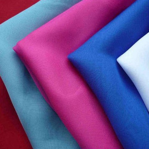 Multicolor Plain Polyester Fabric, for Garments, Specialities : Seamless Finish, Shrink-Resistant