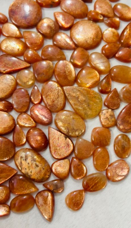 Polished Sunstone Cabochon, for Jewellery, Size : Free Size