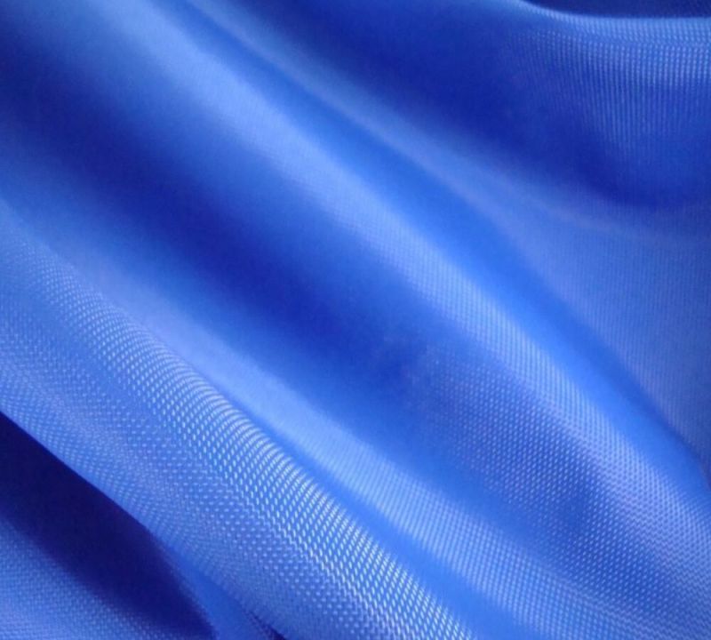 Blue Plain Polyurethane Coated Fabric, for Garments, Packaging Type : PP Bag