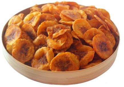 Brownish Masala Banana Chips, for Human Consumption, Packaging Type : Plastic Packet