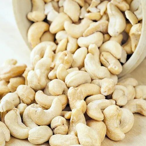 Creamy Whole Cashew Nuts, for Oil, Cooking, Human Consumption, Purity : 100%