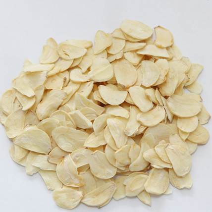 Creamy Dried Garlic Flakes, for Cooking, Grade : Food Grade