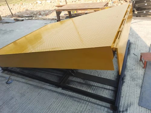 Yellow Polished Steel Hydraulic Dock Leveler, Capacity : 9000 Kg