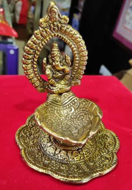 Golden Carved Polished Brass 140 Gm Deepak Ganesh Statue, for Office, Home, Gifting