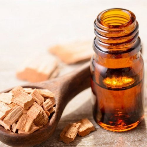 Pale Yellow Sandalwood Essential Oil, for Medicines, Cosmetics, Packaging Type : Glass Bottles