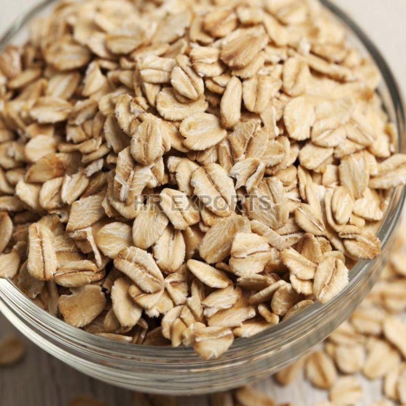 Common Indian Brown Rolled Oats, for Breakfast Cereal, Style : Dried