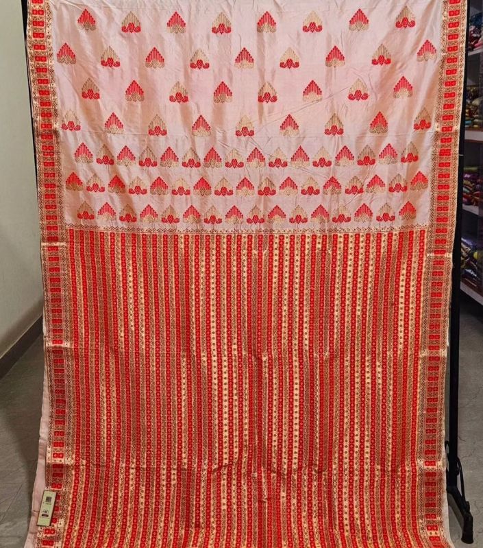 Orange Party Wear Assam Silk Saree, Speciality : Dry Cleaning, Shrink-Resistant