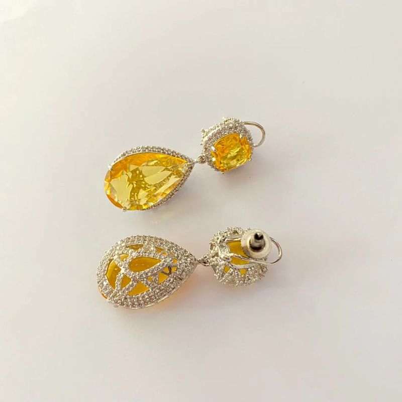 Metal Yellow Diamond Earrings, Gender : Female