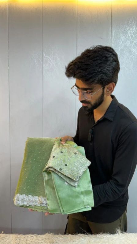 SHIMMERY SILK SAREE WITH HEAVY STONES EMBEDDED