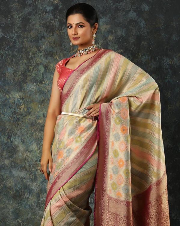Green and Pink Woven Striped Blended Fancy Banarasi Silk Saree