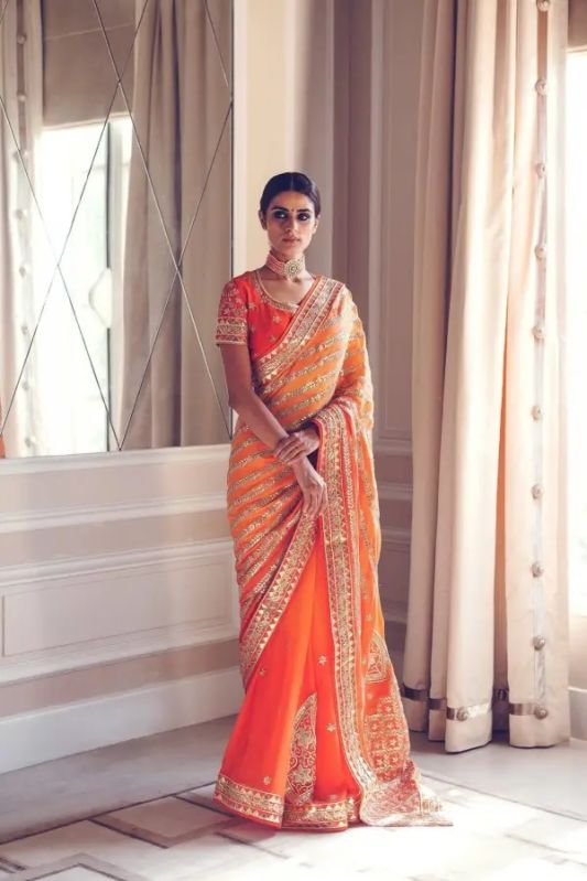 Fascinating Orange Saree In Pure Georgette