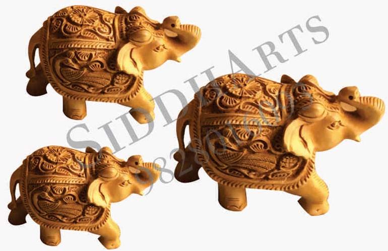 HAND CARVED WOODEN ELEPHANT STATUE