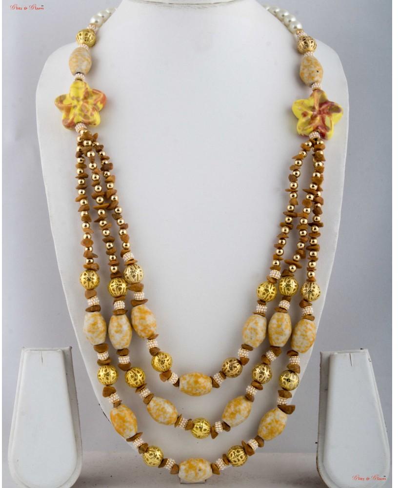 Fashion Necklaces - three-layered neck piece attached to white Pearls.