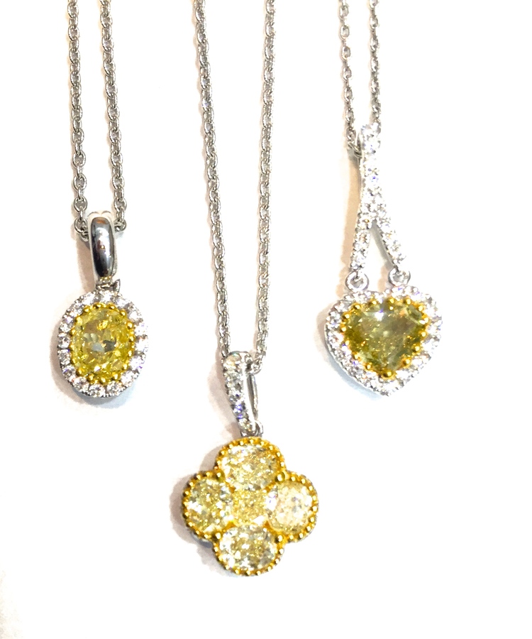Fancy yellow diamond pendants