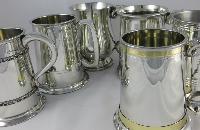 Silver beer mugs