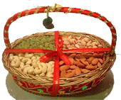 Mix dry fruits in cane basket arrangement
